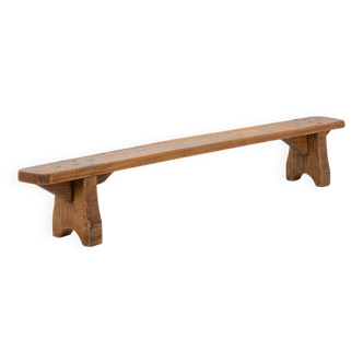 Banc bas rustique en bois massif, France vers 1850