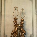 Deux enfants en bois sculpté doré, lampes de table
