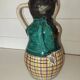 Vintage figurative pitcher in glazed terracotta – Female character