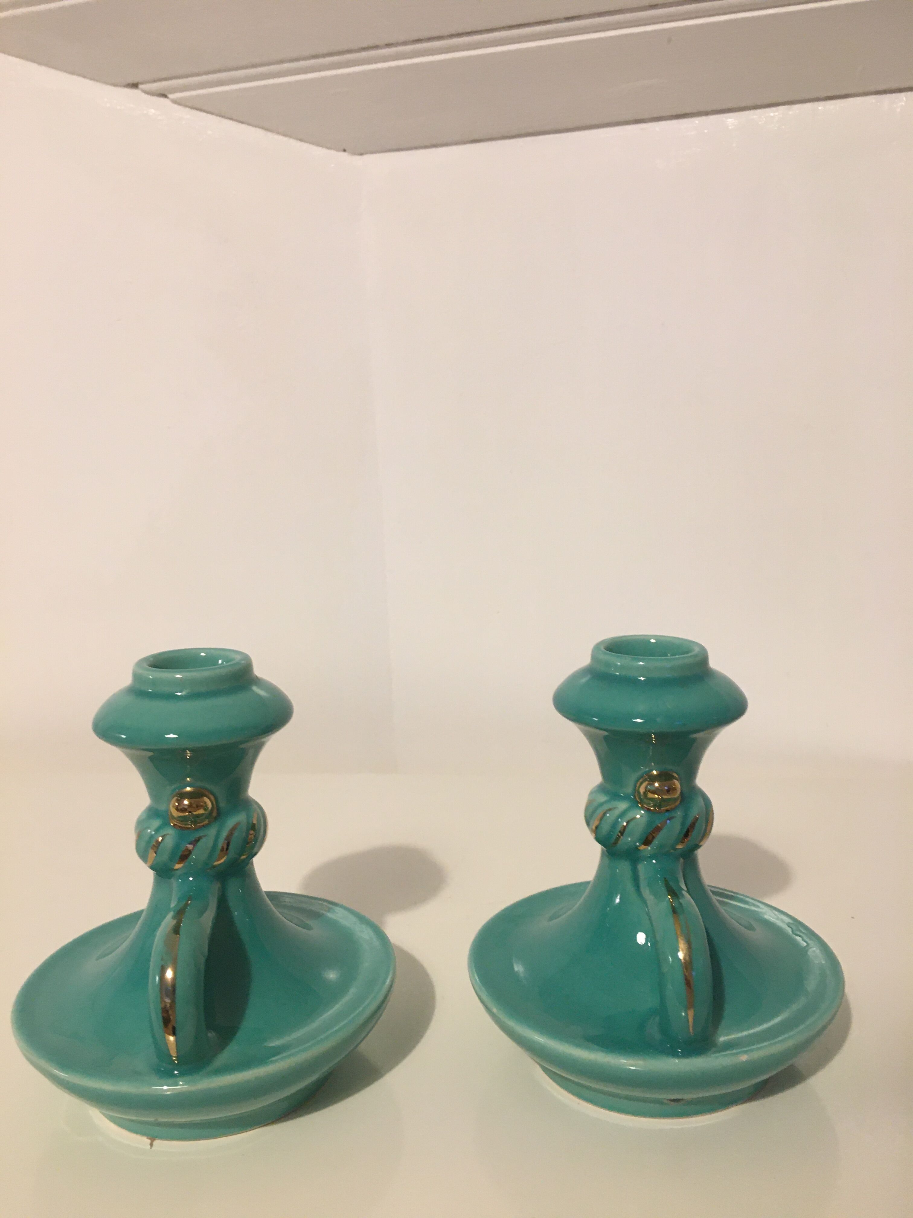 Pair of turquoise ceramic candlesticks