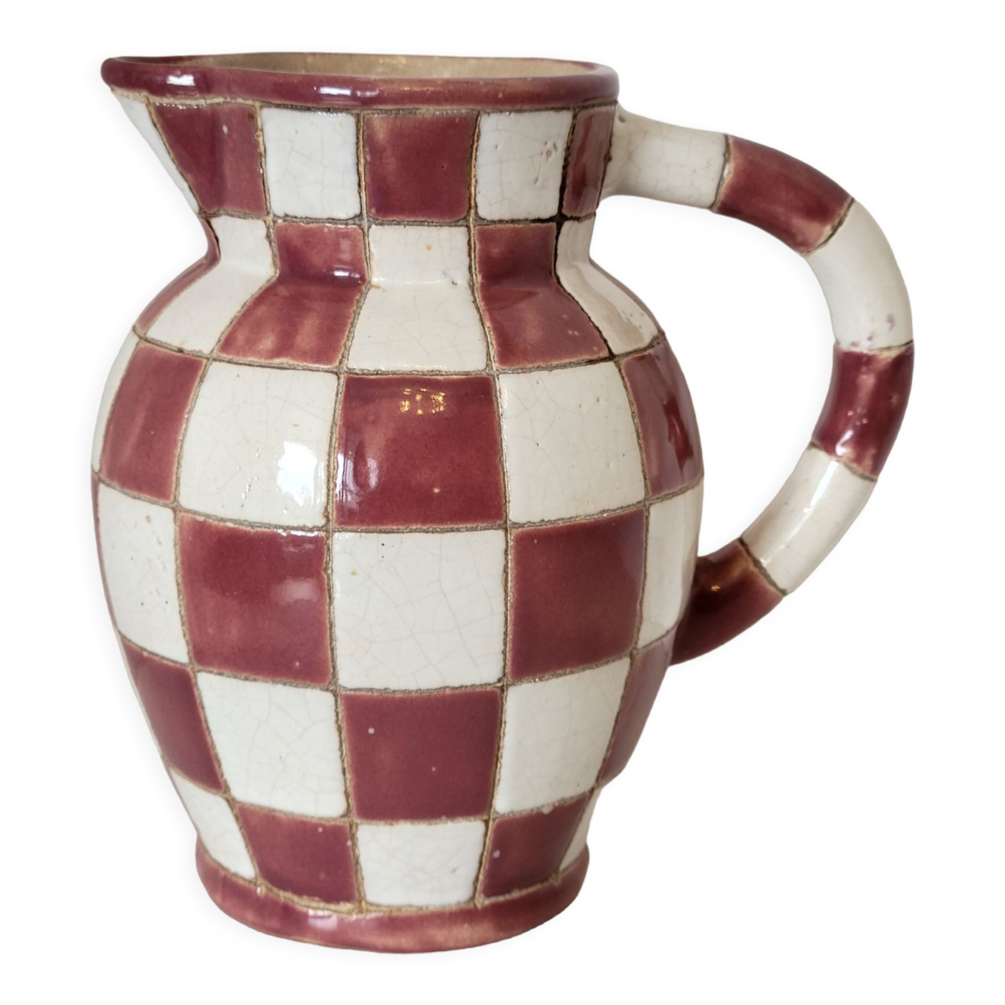 Old ceramic pitcher pattern checkerboard tiles