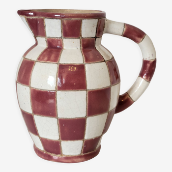 Old ceramic pitcher pattern checkerboard tiles