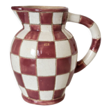 Old ceramic pitcher pattern checkerboard tiles