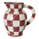 Old ceramic pitcher pattern checkerboard tiles