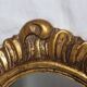 Miroir doré en bois