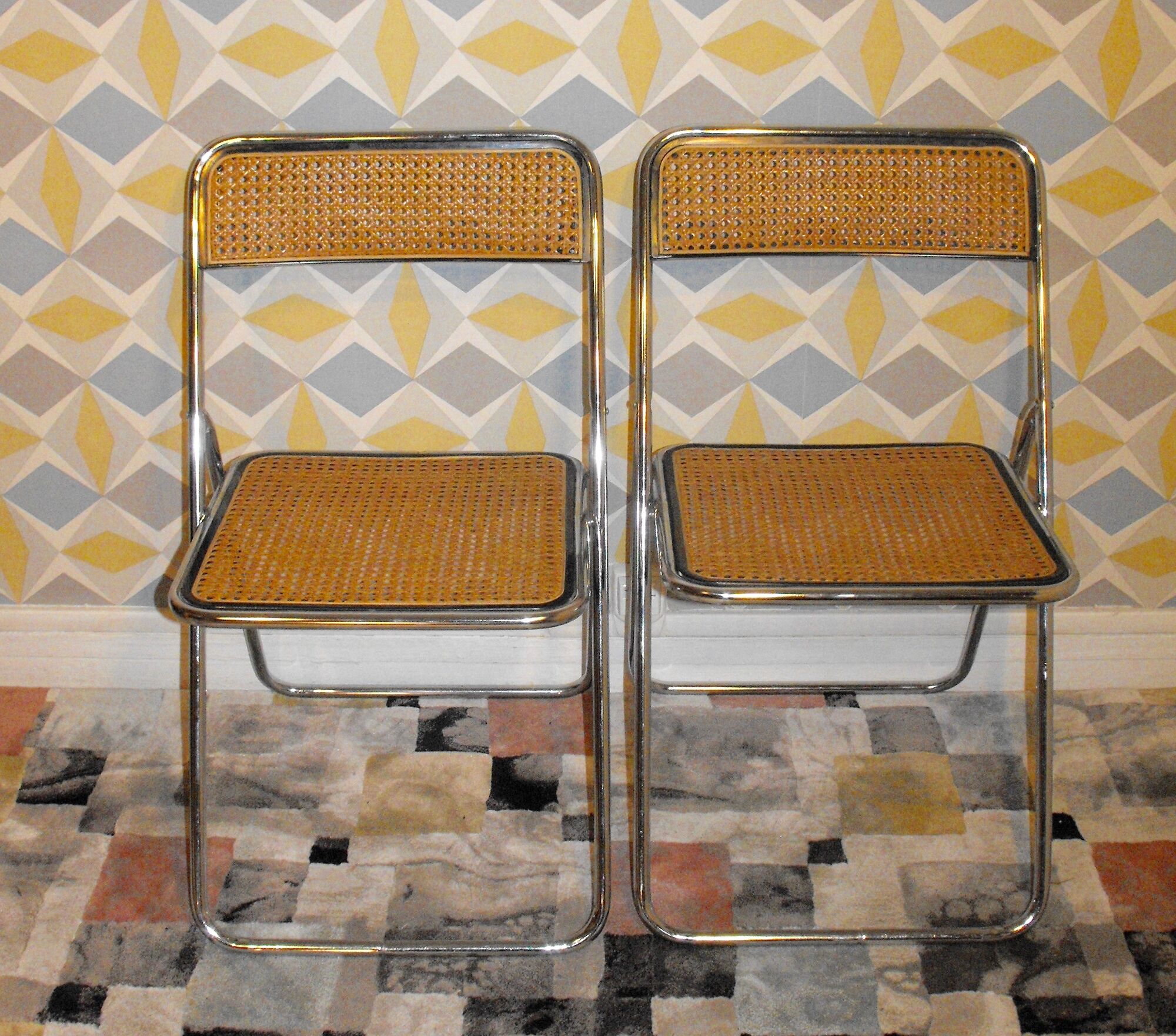Pair of vintage folding chairs with caning 70