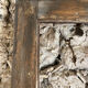 Old glazed wooden door patinated