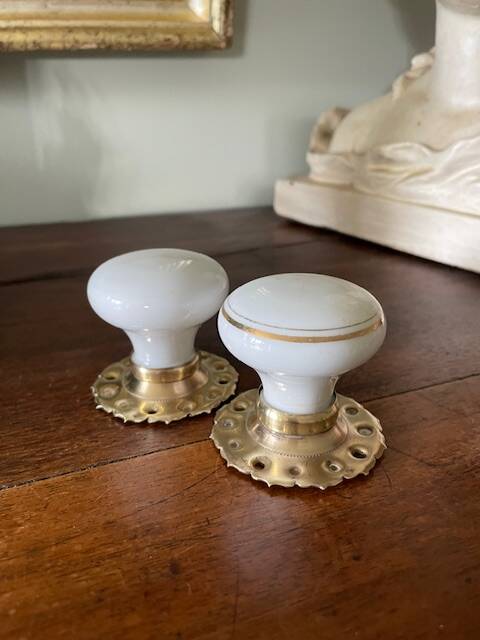 pair of round porcelain and copper Art Deco handles