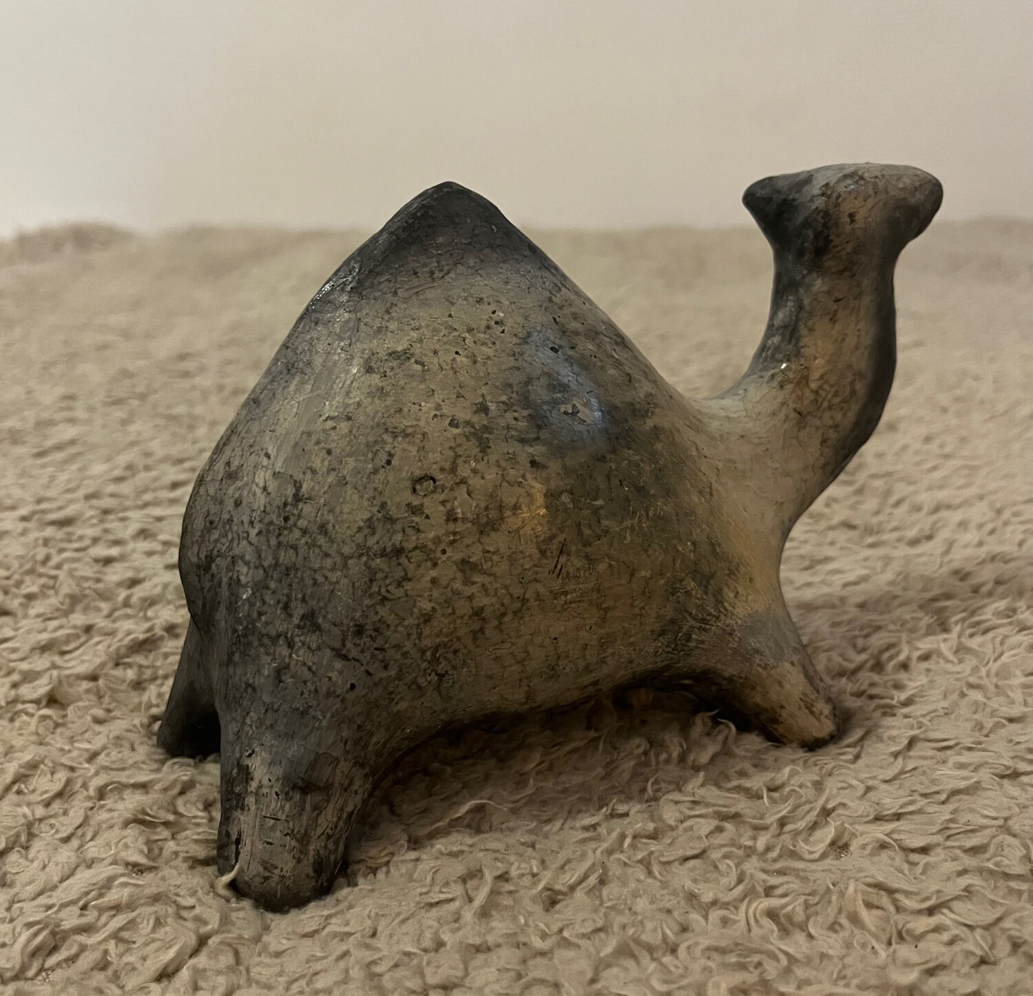 Ceramic camel statuette