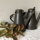Two workshop burettes, indoor watering cans
