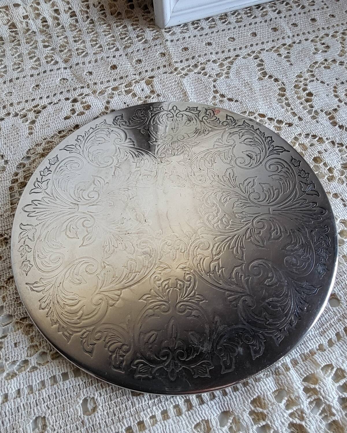 Silver-plated metal trivet English