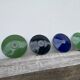 4 green, black and blue enamelled sheet metal suspensions