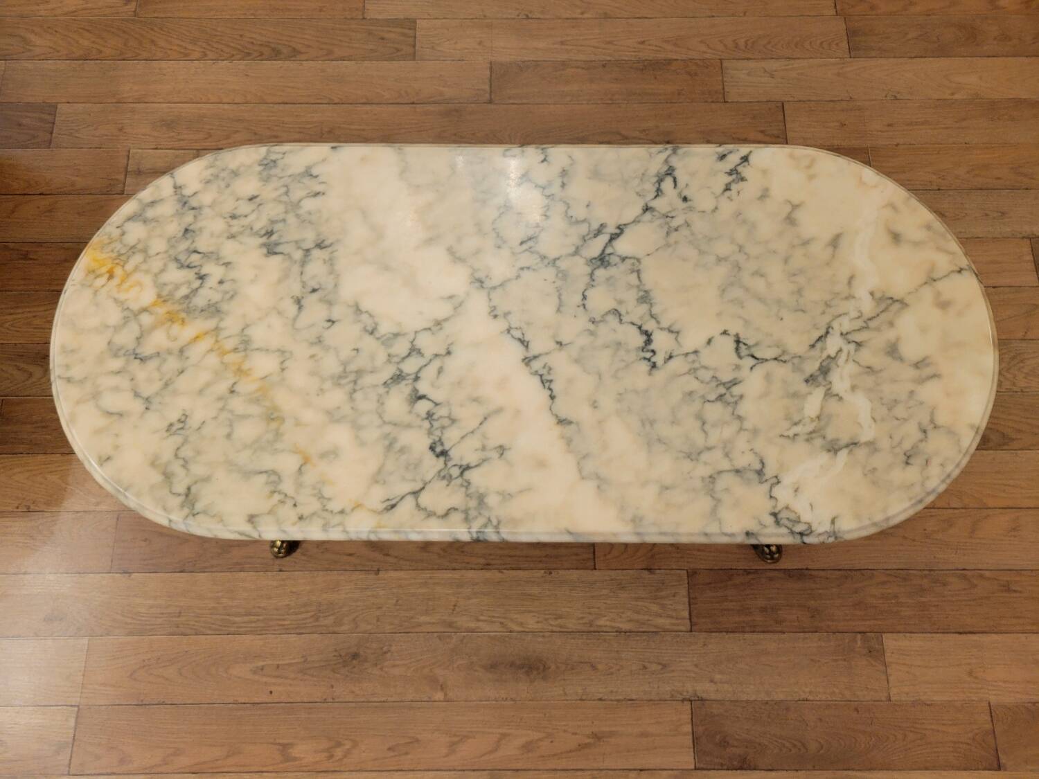 Coffee table in gilded bronze and marble