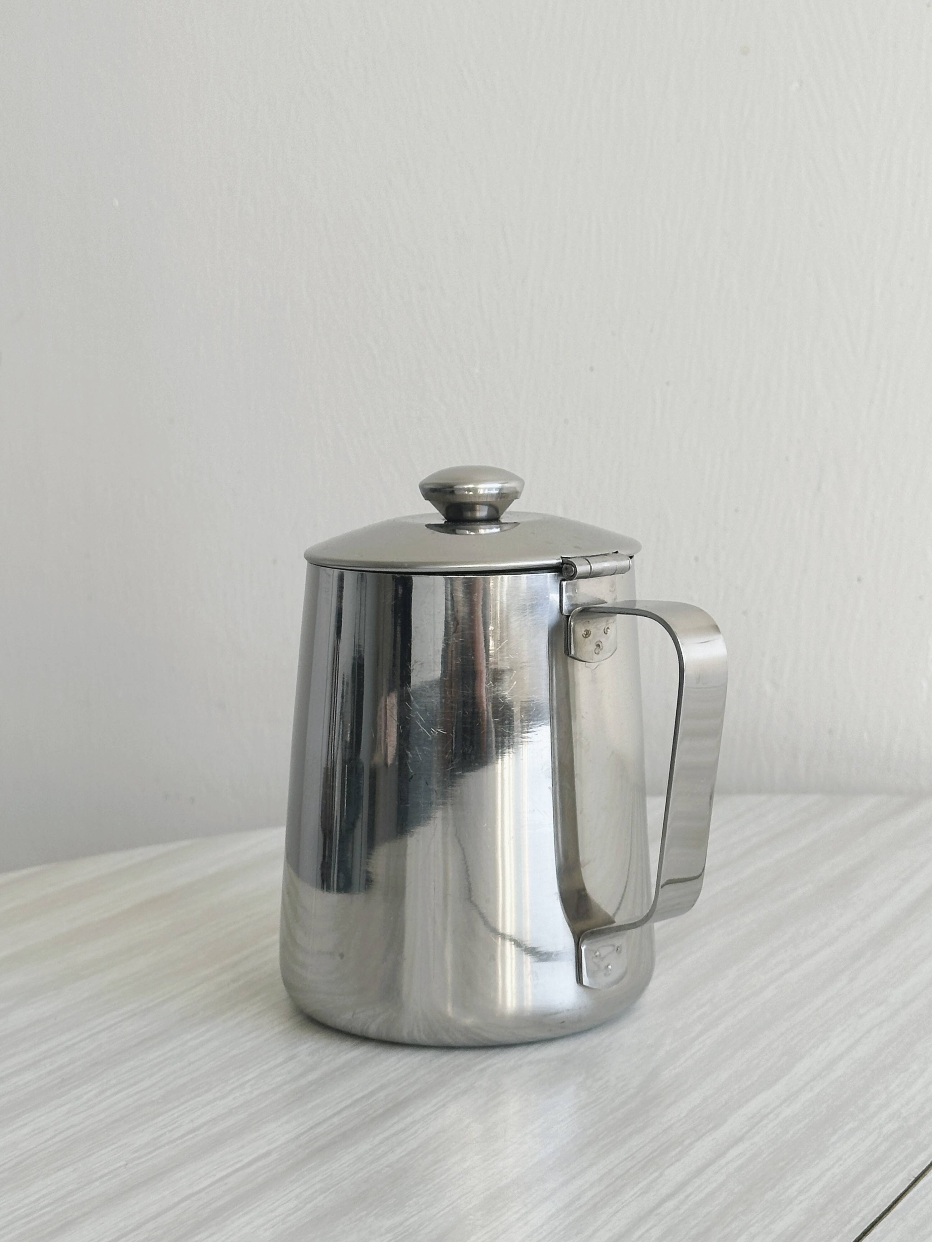 Milk jug, carafe in shiny stainless steel