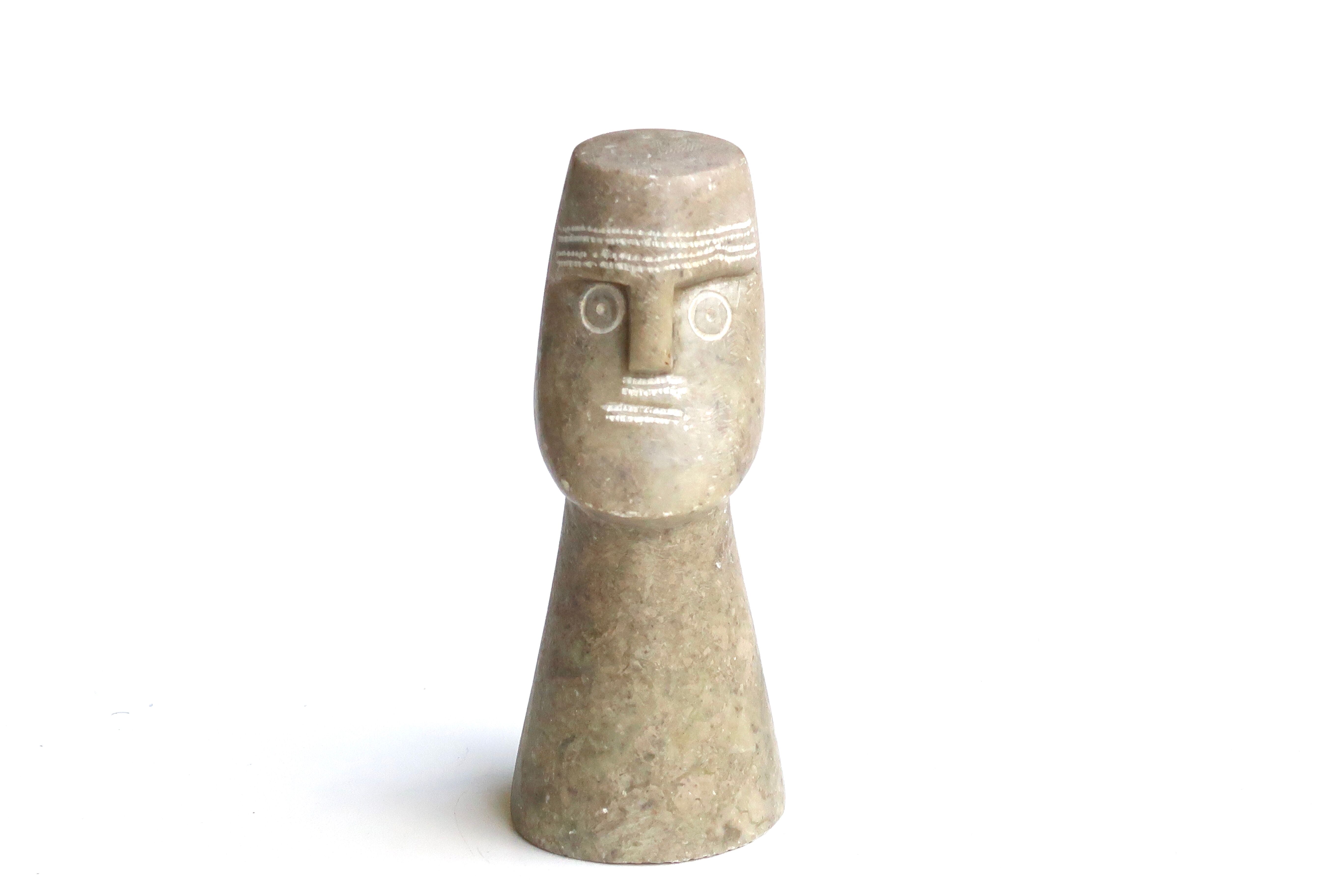 Ethnic stone bust, 70s