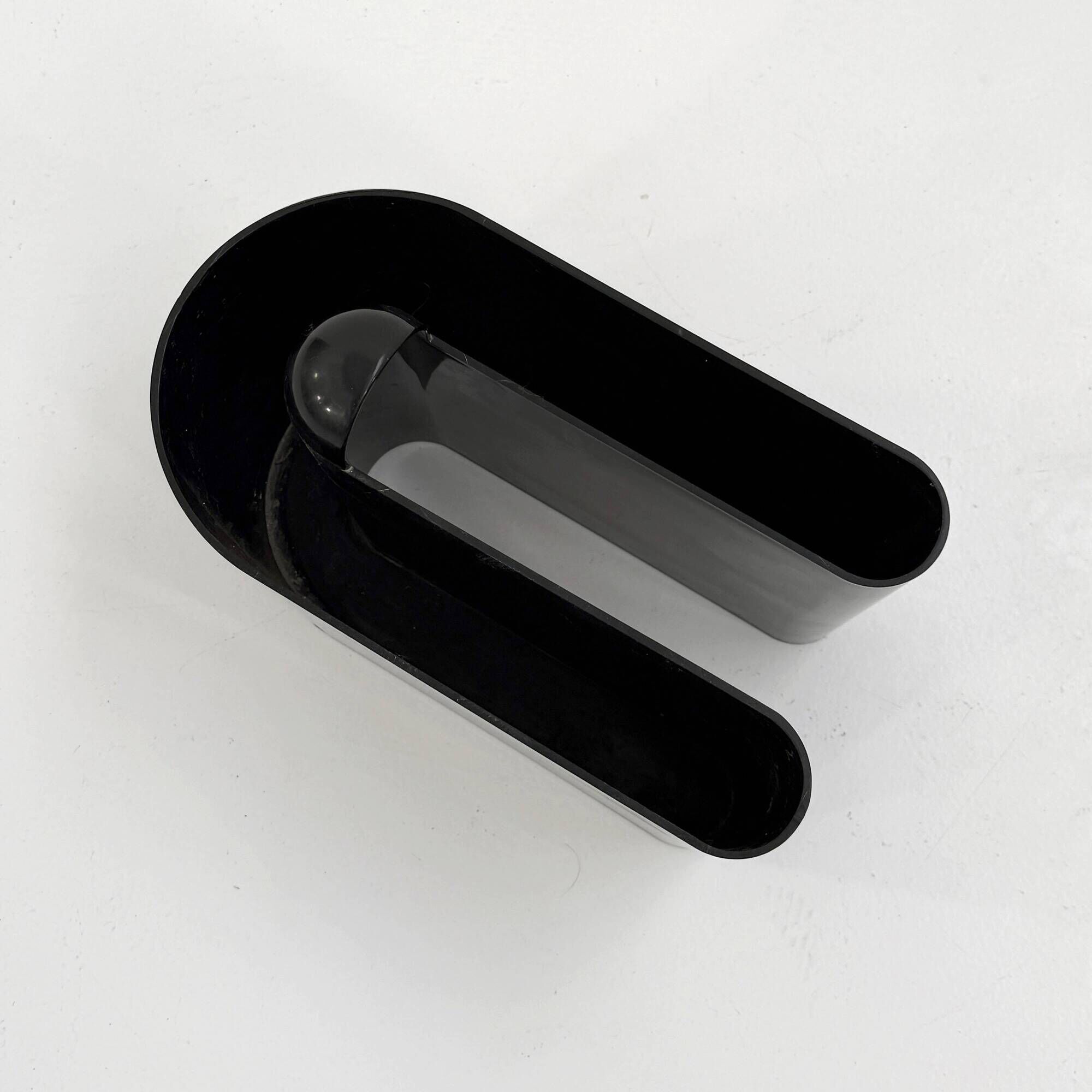 Black magazine rack by Rodolfo Bonetto for Bilumen, 1970