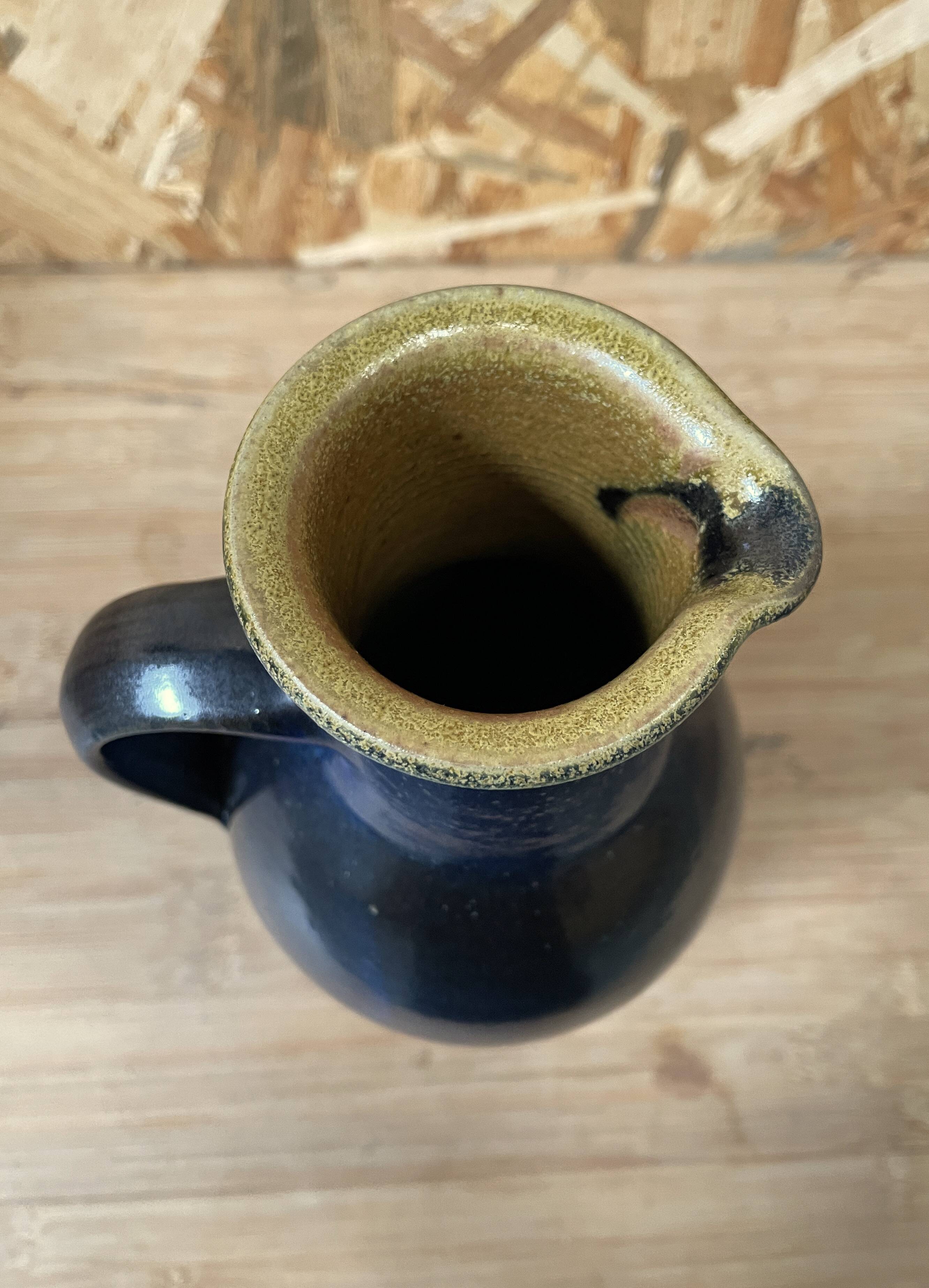 Blue stoneware pitcher by Herbert Schulze Crinitz