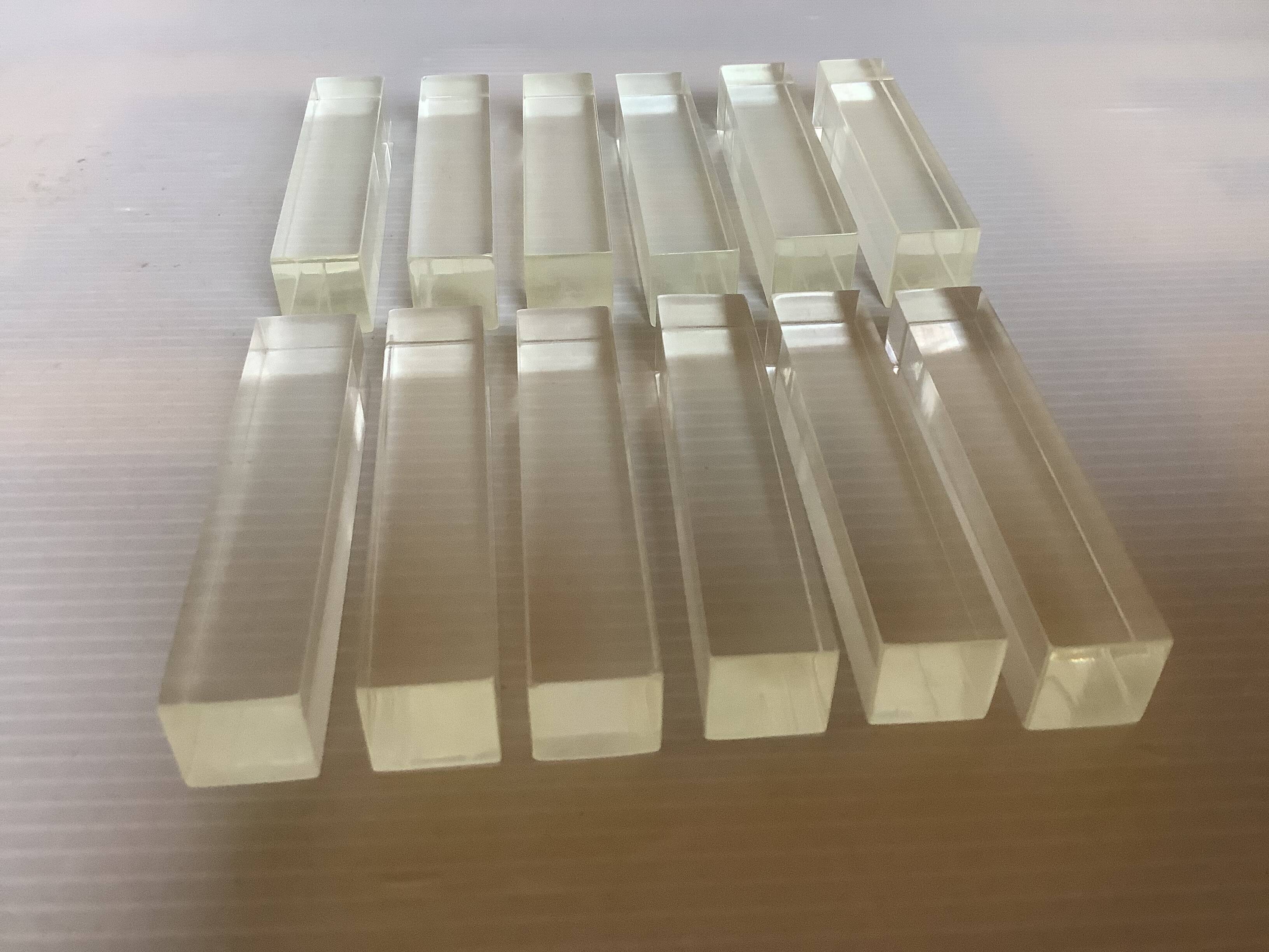 Twelve old lucite knife holders