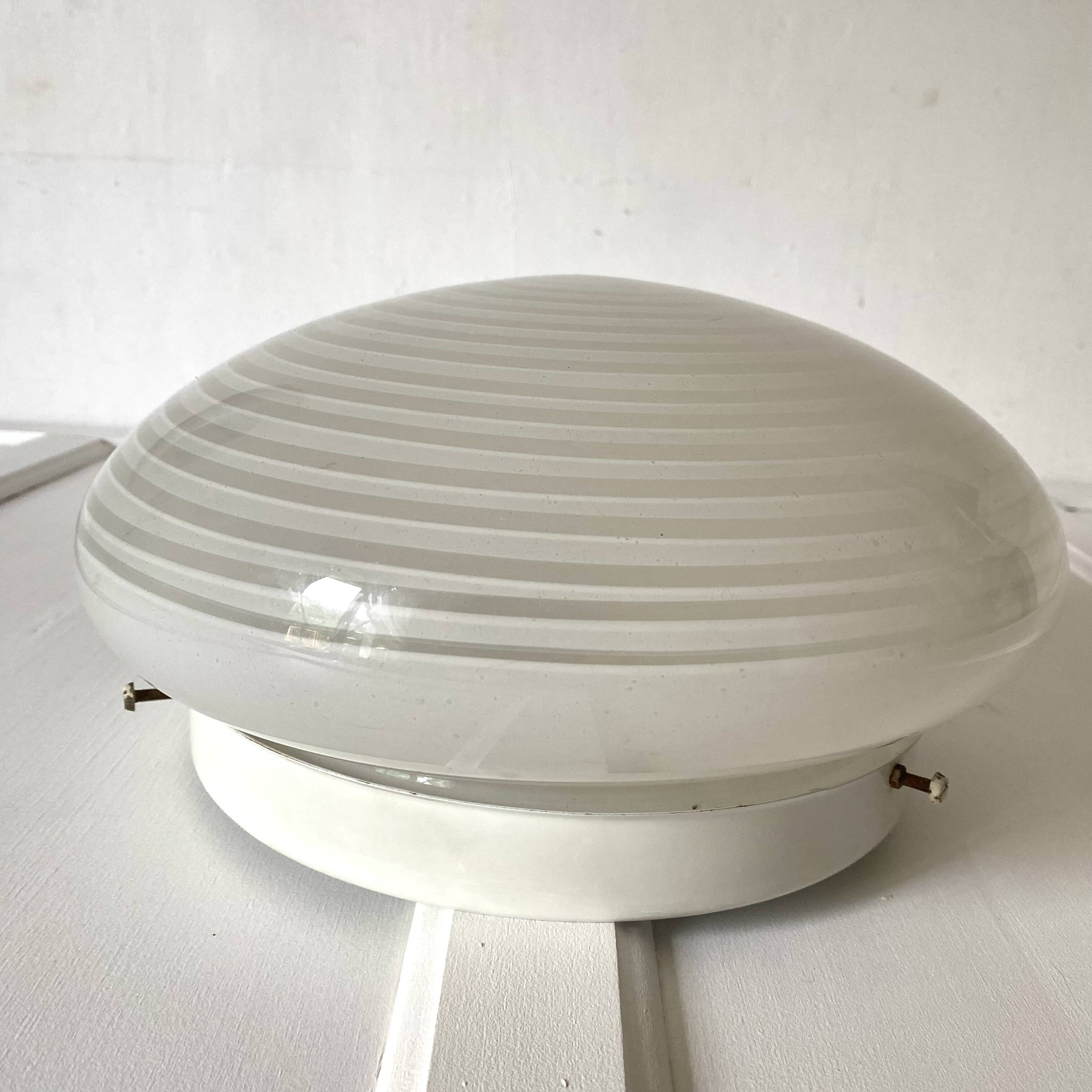 Round curved spiral ceiling light space age