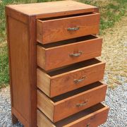 Vintage 1950s chest of drawers with tapered legs and 5 drawers.