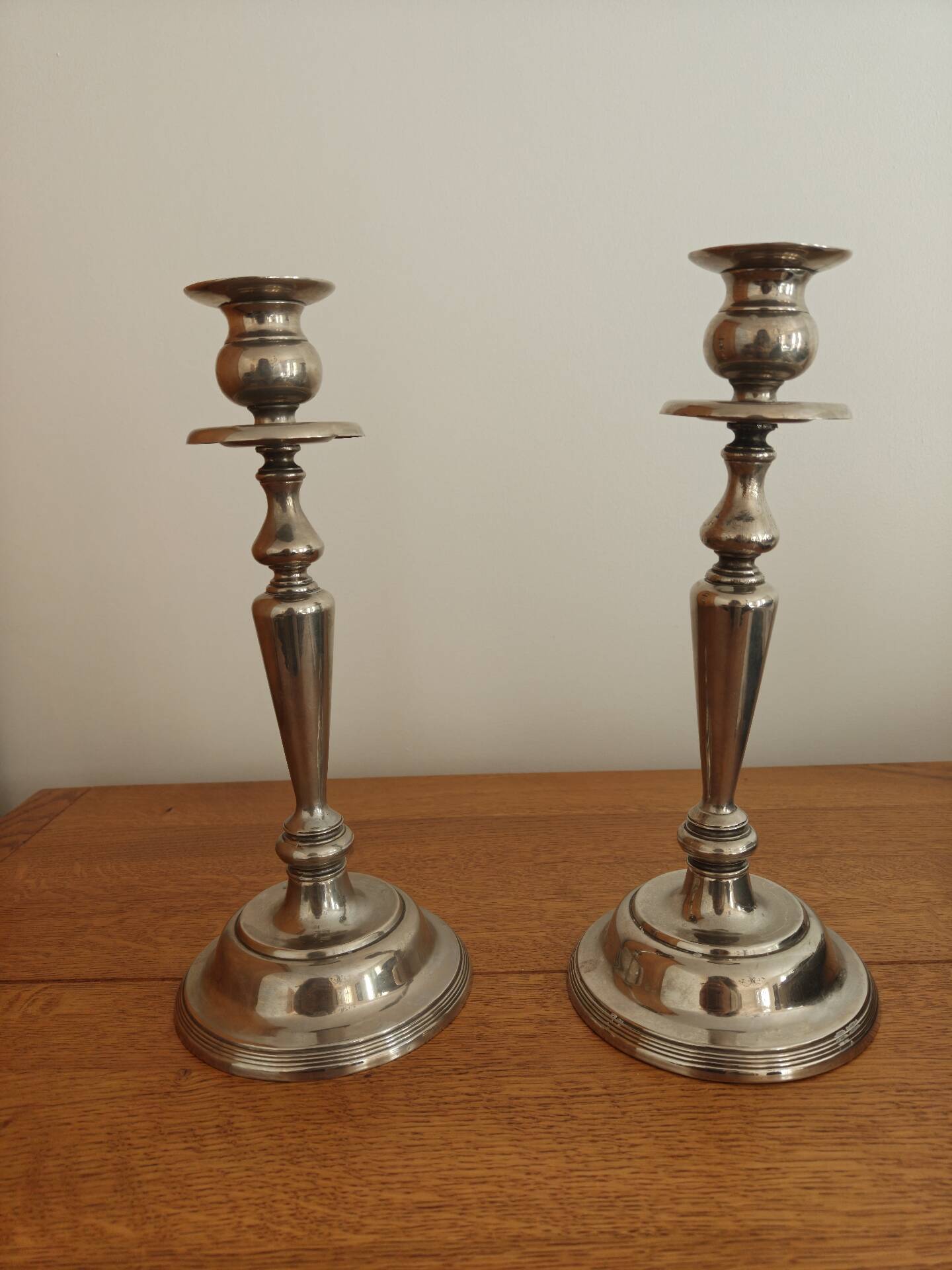 Pair of antique silver-plated candlesticks
