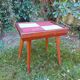 Table vintage en bois pieds compas