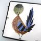Square ceramic trivet with a bird by Jean Pierre Caffarelli.