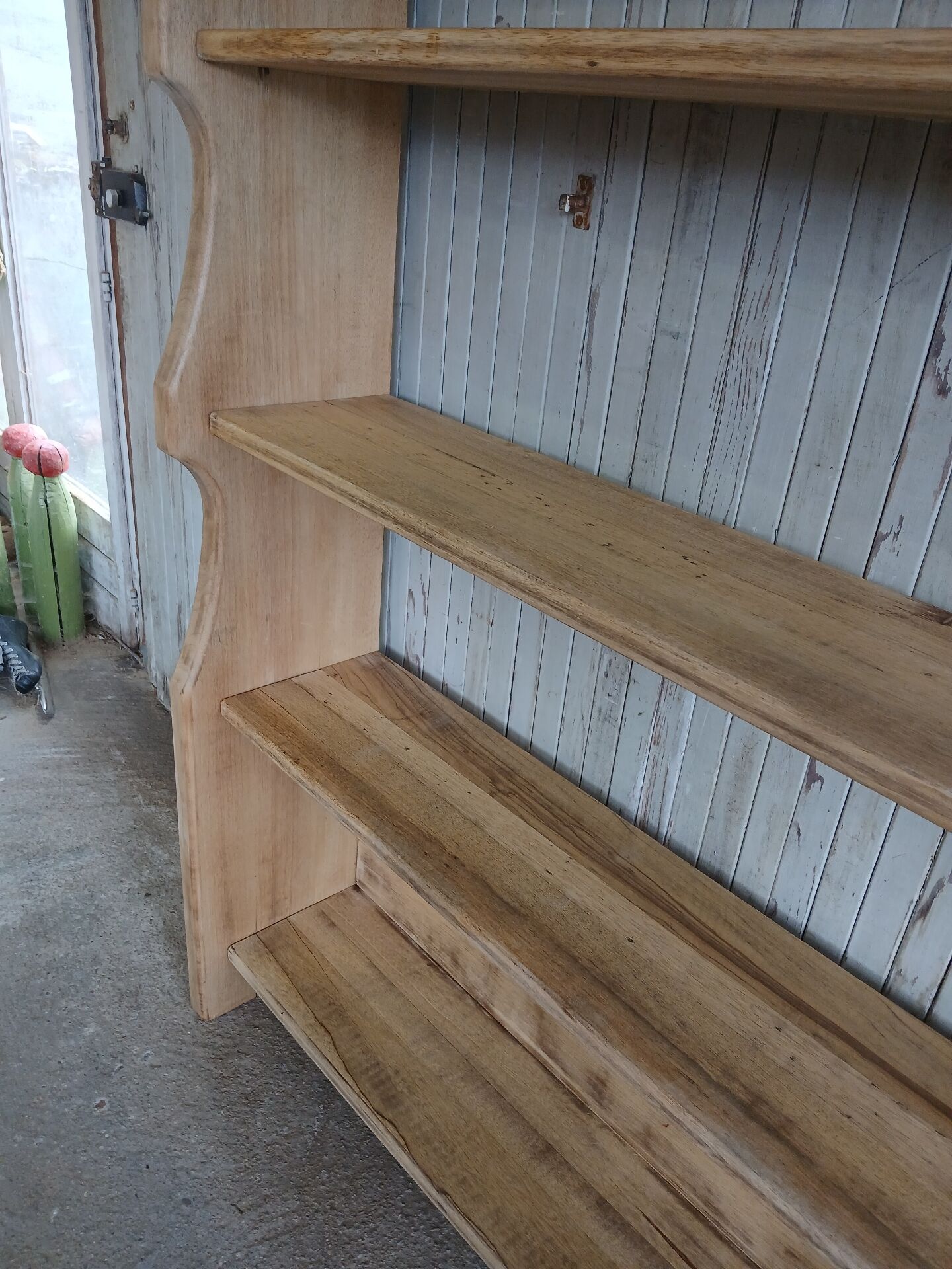 Solid wood shelf in brutalist style