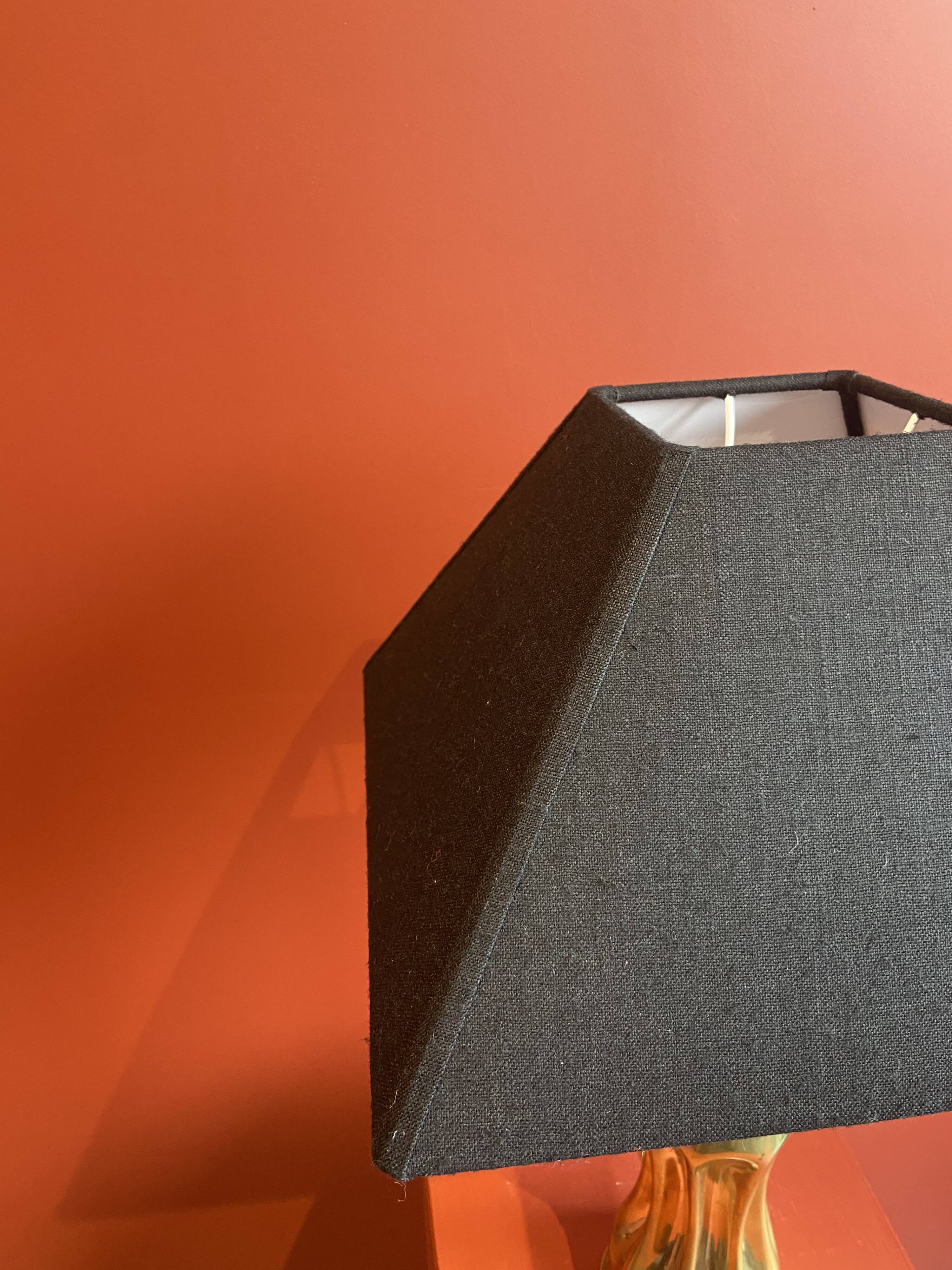Brass shell socket lamp from the 1st WW, black pyramidal lampshade in Carlucci linen.
