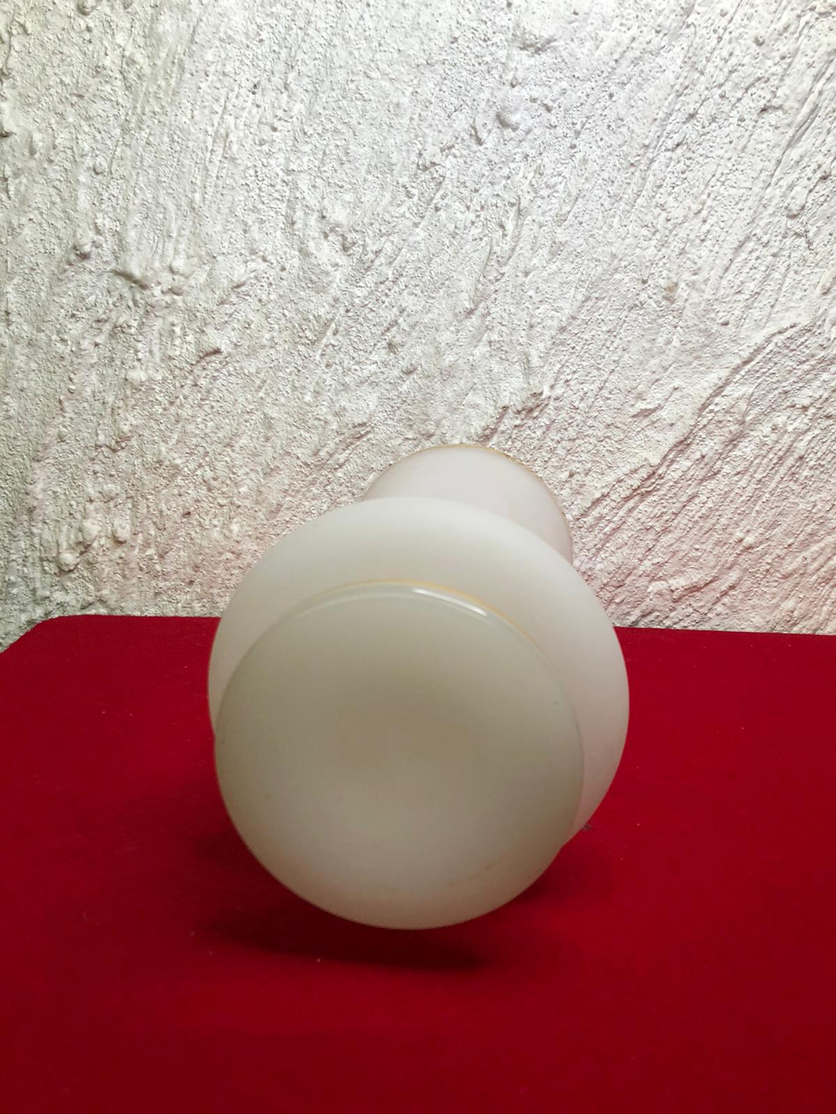 Old white and gold opaline vase