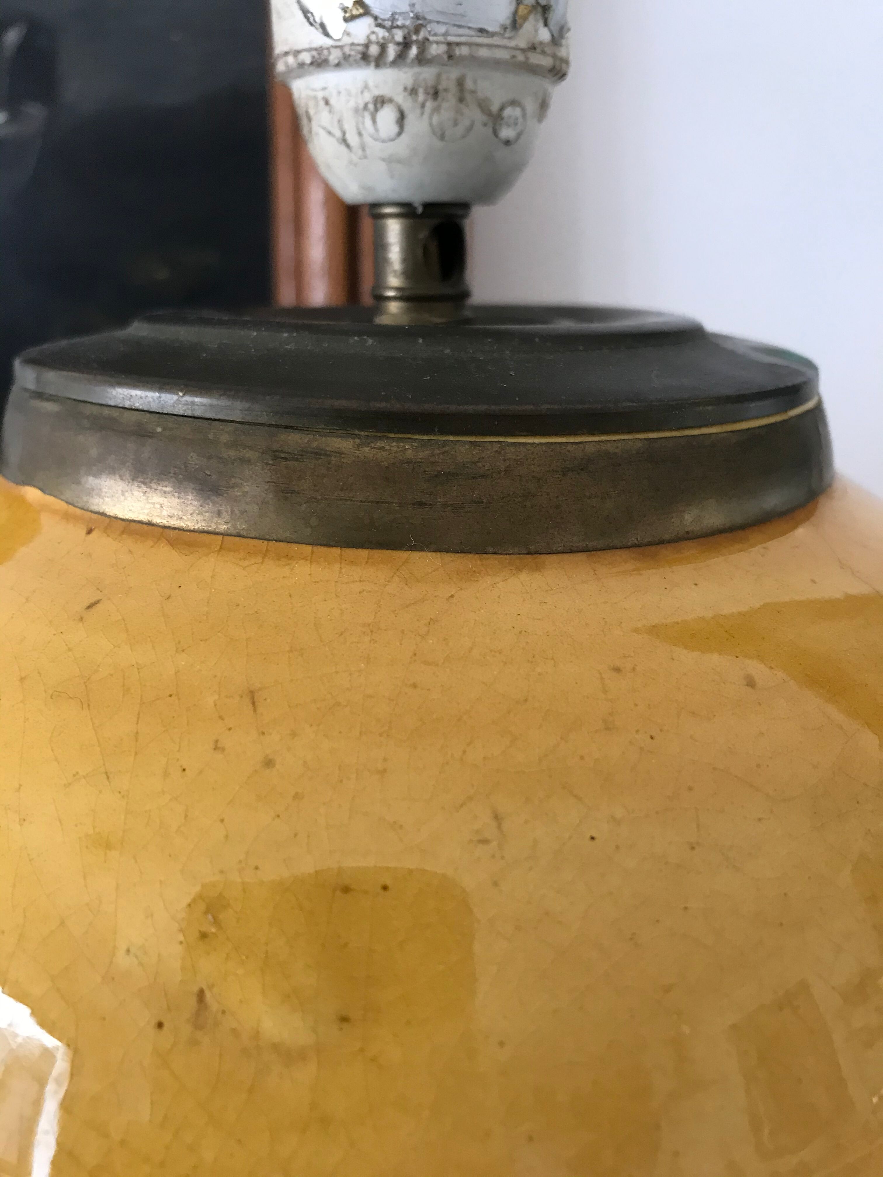 Ancient ceramic and brass lamp foot