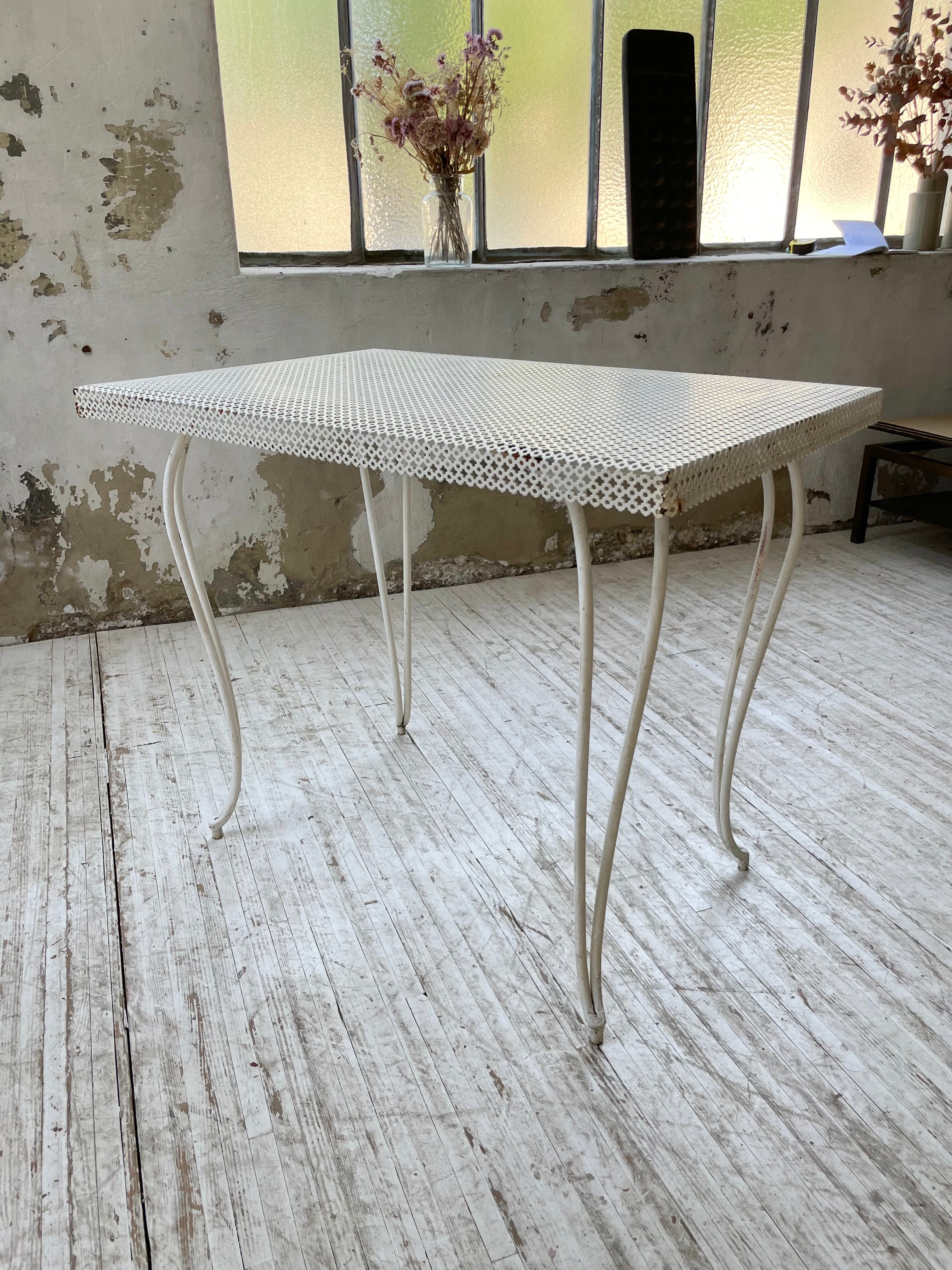 Perforated garden dining table