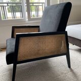 Fauteuil en velours noir et cannage