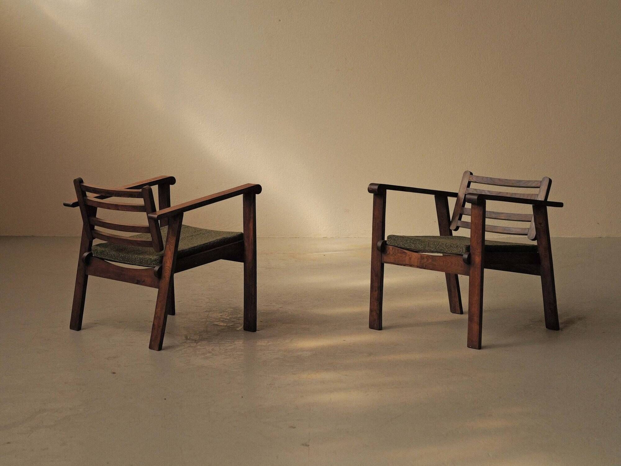 Pair of modernist armchairs in oak, Reconstruction, circa 1940
