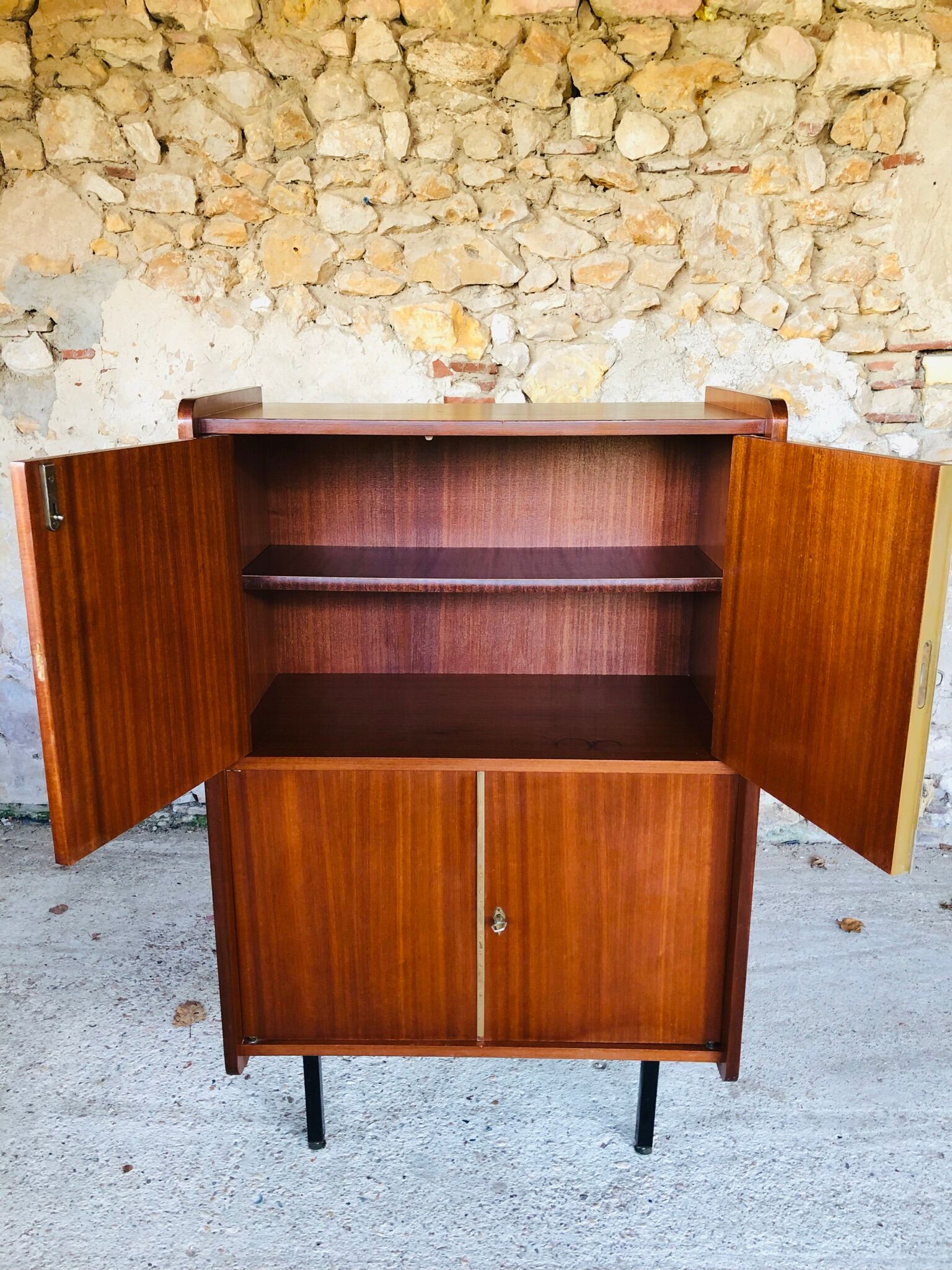 Storage cabinet with double compartment, metal feet circa 60's