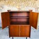 Storage cabinet with double compartment, metal feet circa 60's