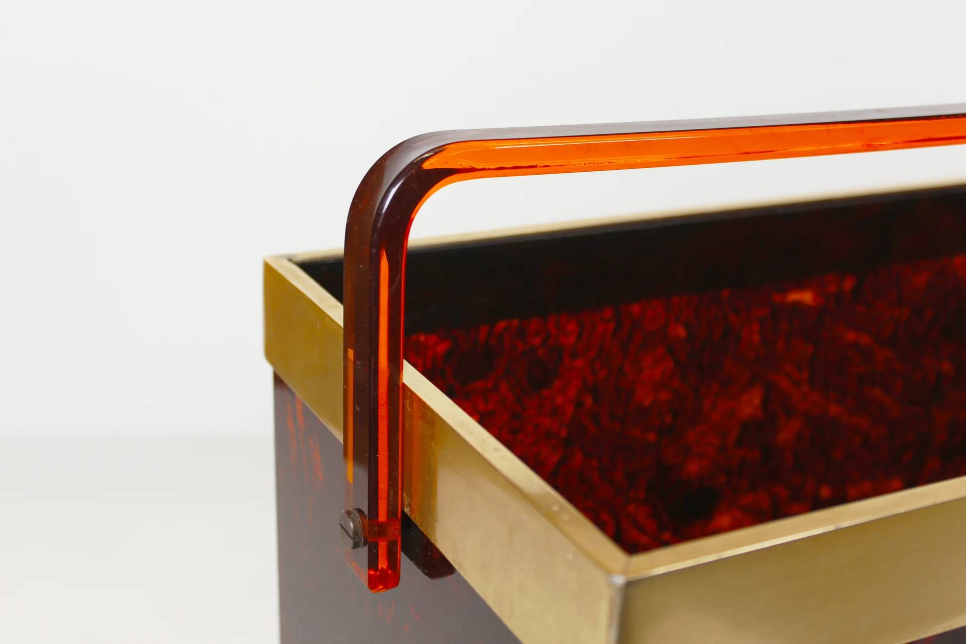 Italian magazine rack in 'faux tortoiseshell' and brass