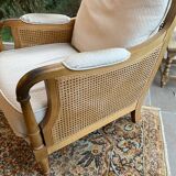 Sofa and armchair in cane and wood by Jean Roche
