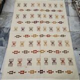 Handmade Berber patterned rug in natural wool