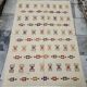 Handmade Berber patterned rug in natural wool