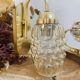 Pair of wall lights in brass and moulded bubble glass, style Helena Tynell.