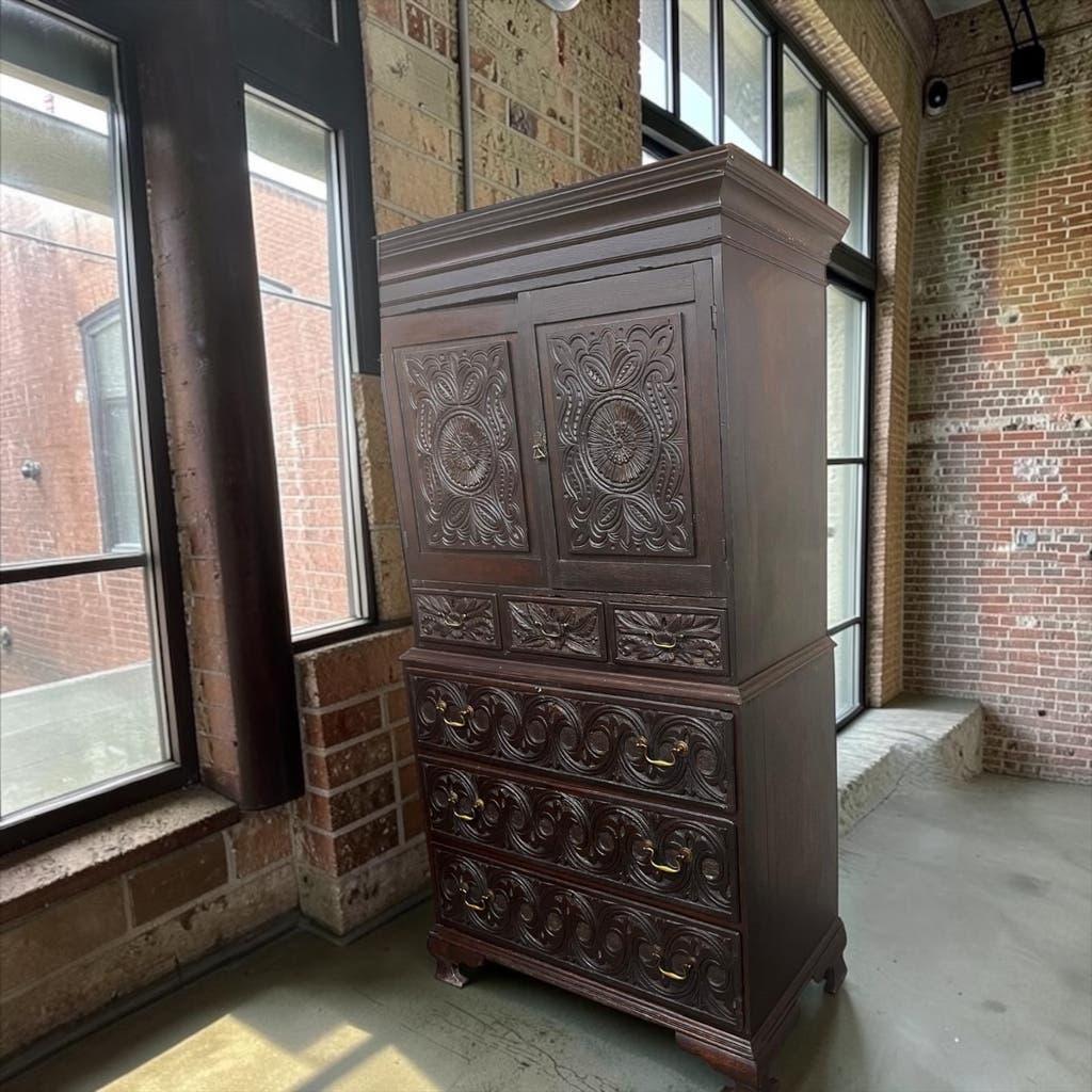 Antique tall wardrobe in dark carved wood / bohemian wardrobe