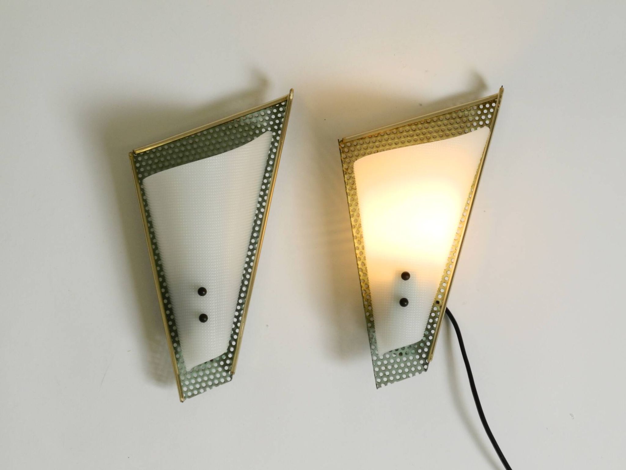Pair of beautiful mint green Mid Century Modern perforated sheet metal wall