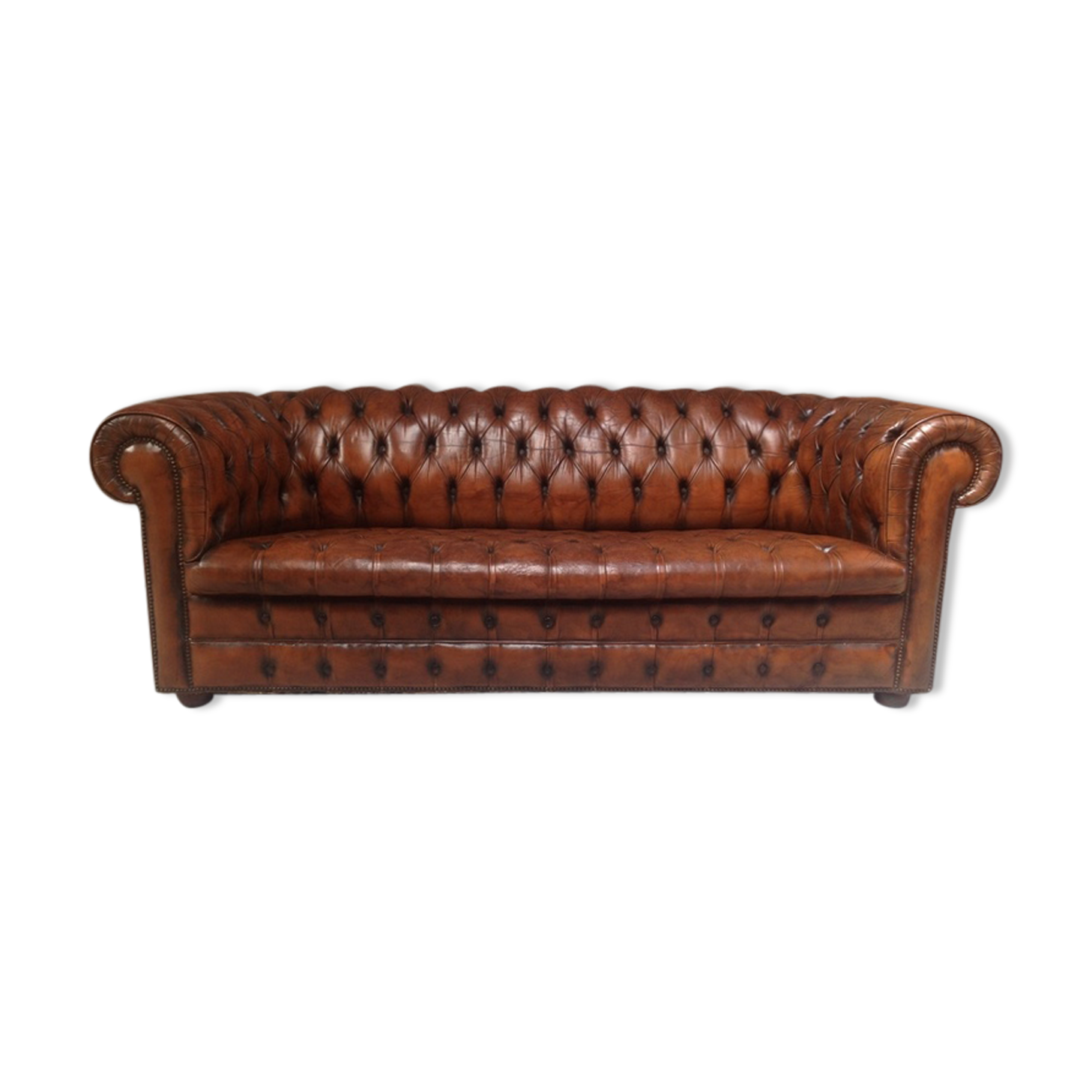 Upholstered chesterfield brown sofa
