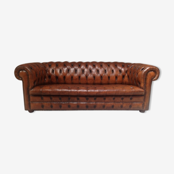Upholstered chesterfield brown sofa