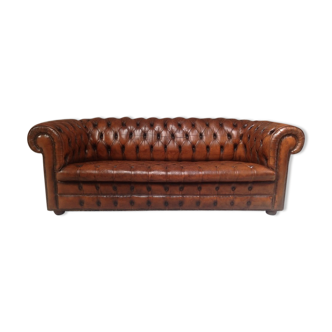 Upholstered chesterfield brown sofa