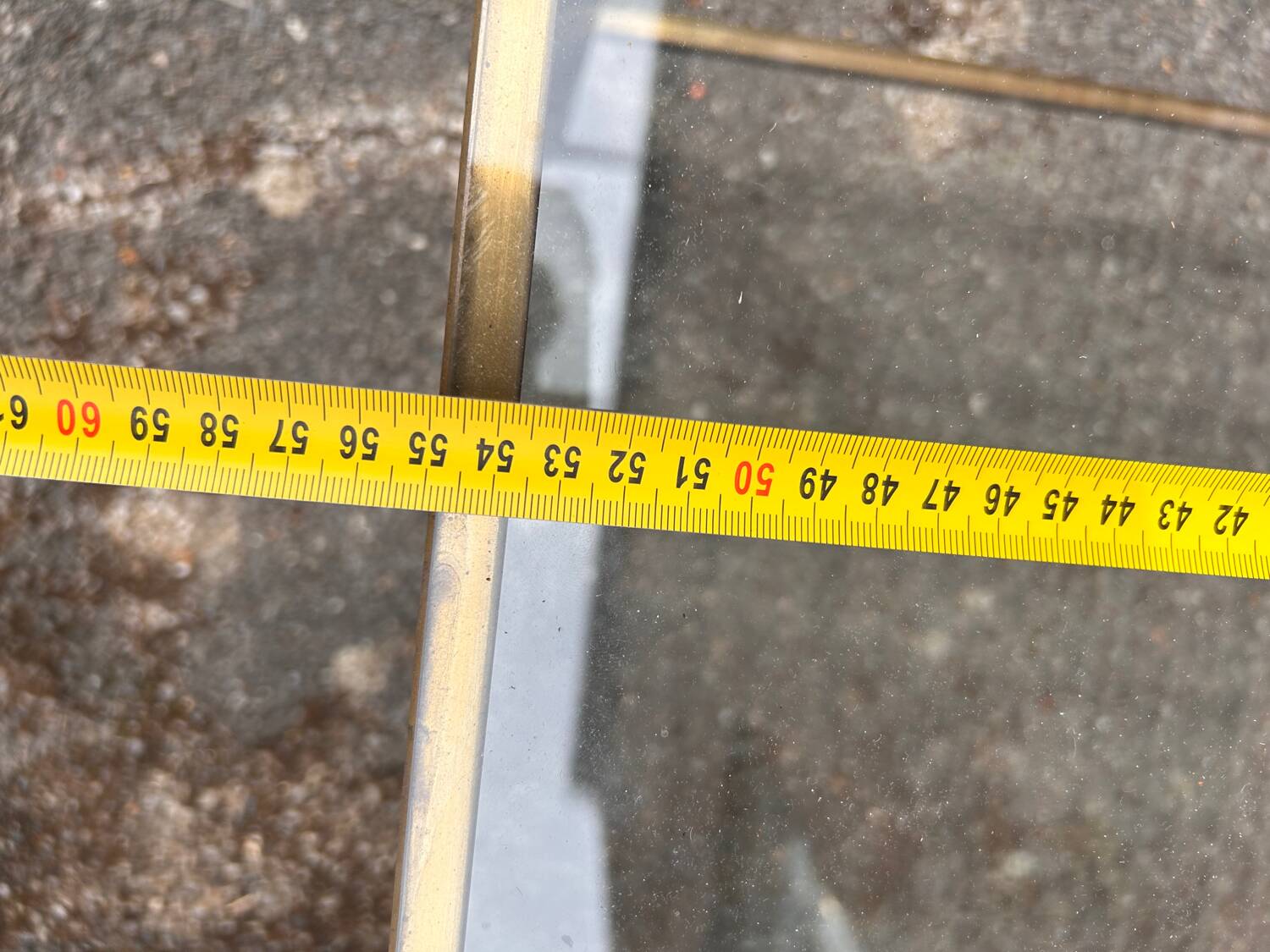 Glass and brass coffee table