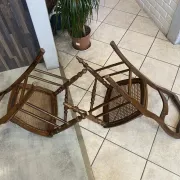 Pair of antique caned and wooden chairs from the 1900s.