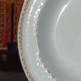 Twelve white porcelain plates
