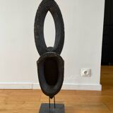 African wooden mask to pose